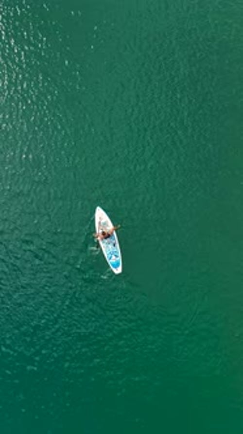 Vertical Video Inspiring Paddleboarding Journey With Stunning Green Canyon Views