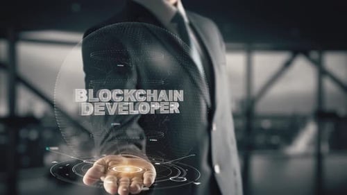 Blockchain Developer with Hologram Businessman Concept