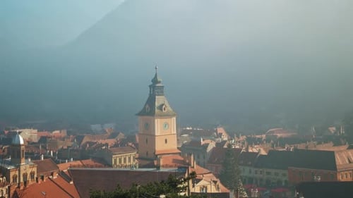View of Brasov Romania Mountains and Fog Beautiful Historical Center with Orange Houses