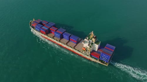 High-angle view of freight ship crossing the ocean, Thailand