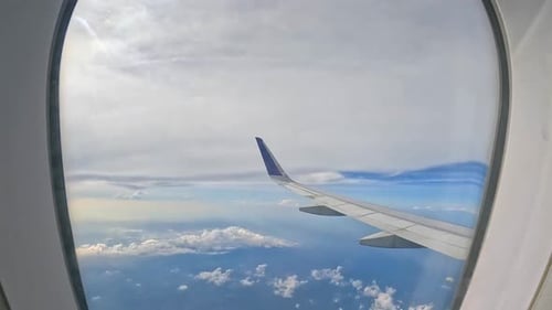 Clouds and Airplane Wings