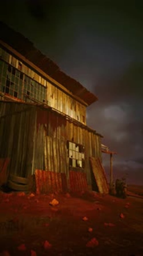 Barn Standing in Field at Night