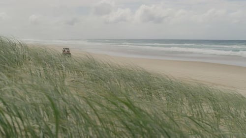 Atv adventure on a remote australian beach with ocean views and open sky