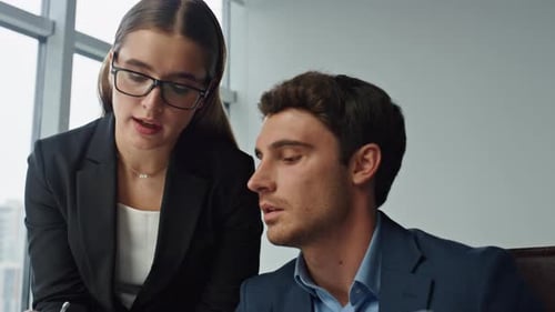 Office teamwork with mentor helping employee analyse financial statistics