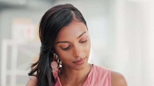Focus, working and business woman reading in an office at work working and planning for a startup