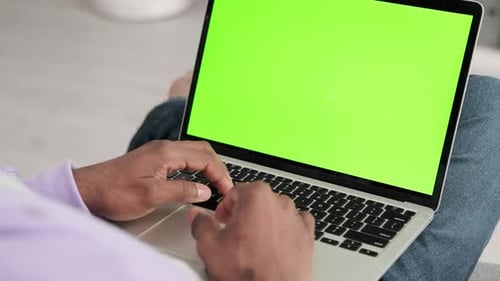 Black Man Using Laptop Notebook Viewing Green Screen Press Keyboard Browsing Chroma Key African