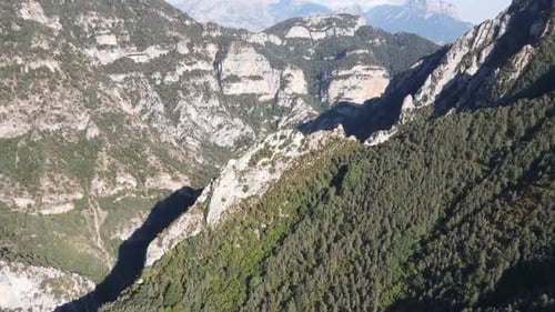 Aerial views of a mountain range with a Valley in the Spanish Pyrenees, near Huesca