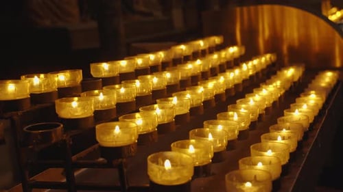 A lot of burning candles in temple. Commemorative candles for day of the dead, cemetery visiting