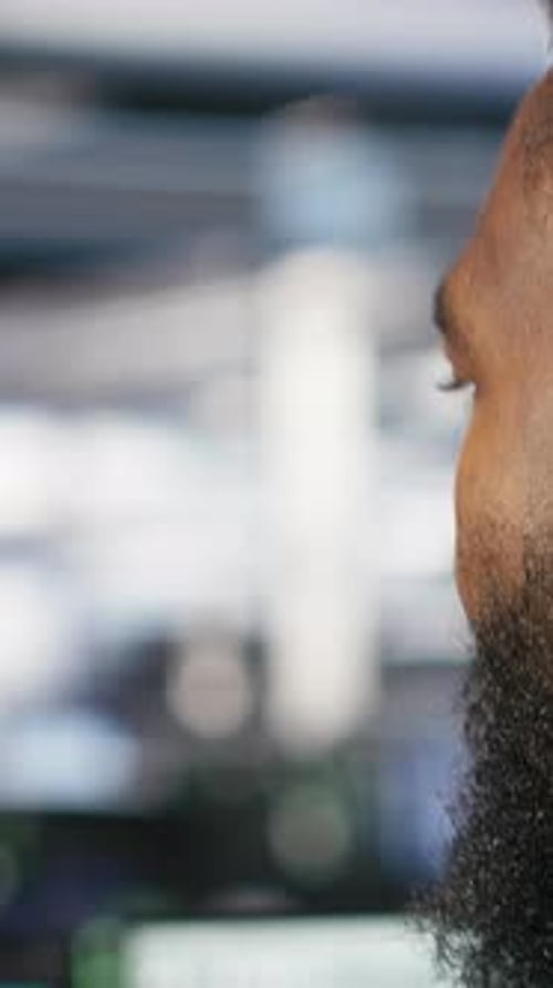 Vertical Video Server Farm Computer Scientist Interprets AI Generated Data Analytics Graphs