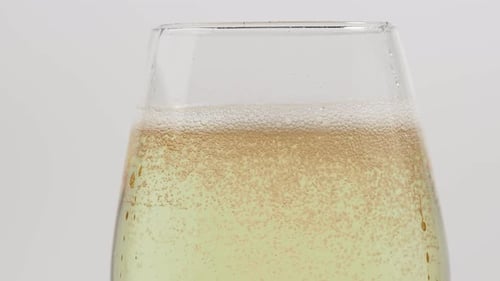 Pour into a glass of white wine.