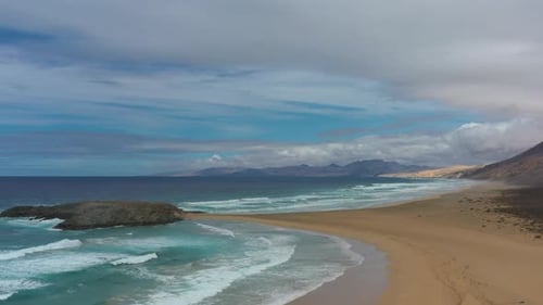 Aerial Drone View of Cofete Islet in Fuerteventura on a Sunny and Cloudy Day