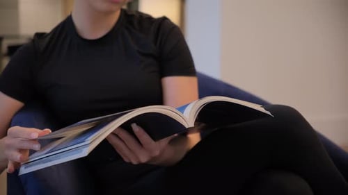 Young Adult Reading Book Indoors