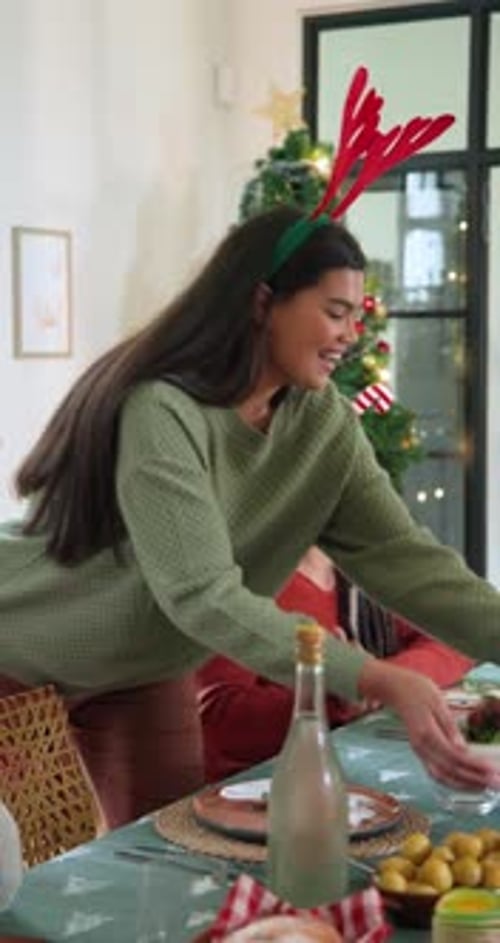 Festive Family Enjoys Christmas Celebration at Home