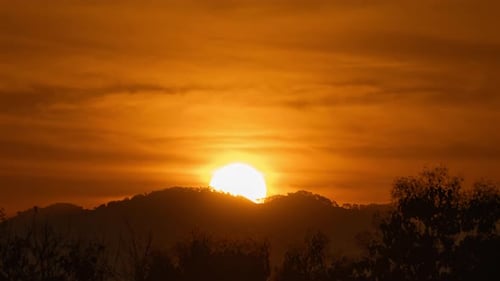 Golden Sunrise over the Mountains Time Lapse