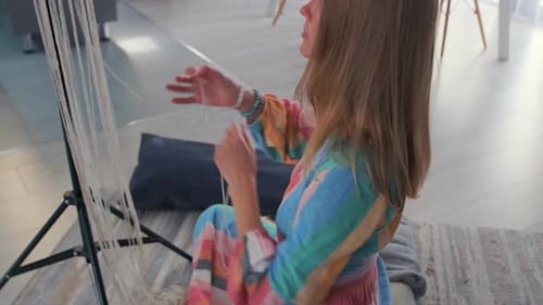 Woman Weaving Macrame at Home Interior