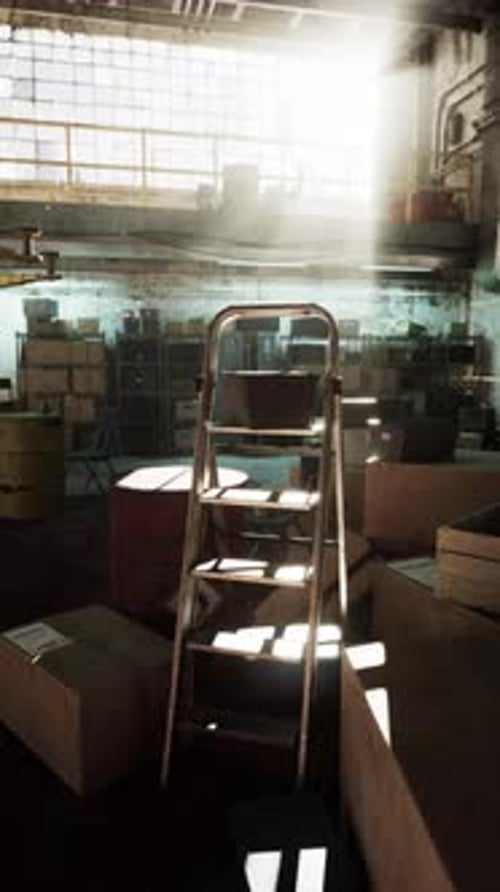Ladder on Boxes in Warehouse
