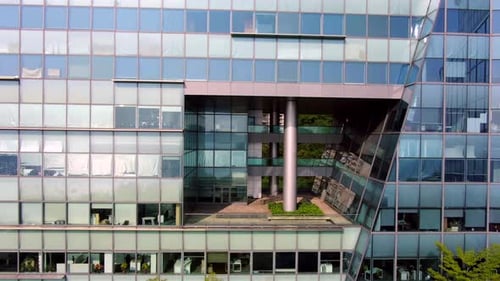 Large Office building facade, Slow aerial dolly movement.