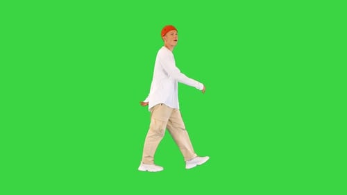 Casual Handsome Young Man Walking and Start Dancing on a Green Screen Chroma Key