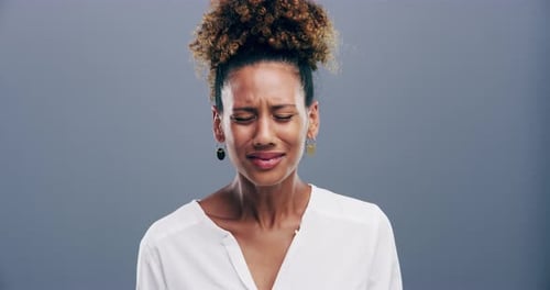 Distressed Woman Crying in Studio Close Up
