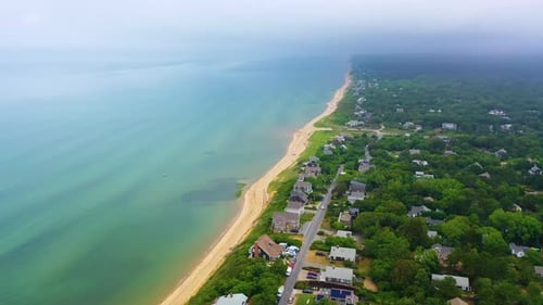 Cape Cod Oceanfront Homes and Sandy Shoreline on Cloudy Summer Day
