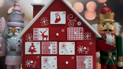 Wooden Tree Advent Calendar Decorated and Nutcracker Soldier Toys With Bokeh Blured BackgrWooden Tre