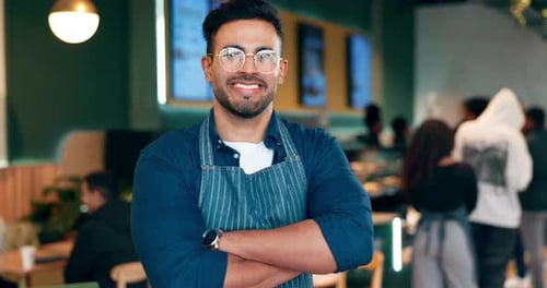 Happiness, arms crossed and coffee shop man, cafe waiter or barista with career smile