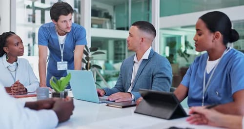 Man, laptop and nurse training with teamwork in office building for medical solution