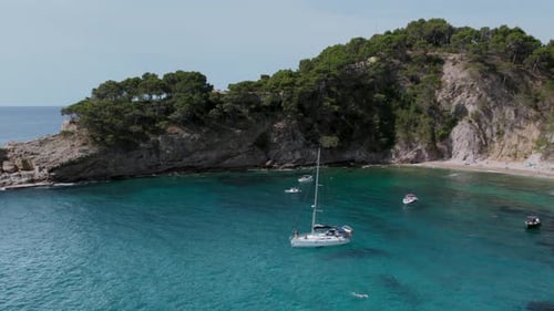 Aerial Drone View on Sail Boat in Ocean Water