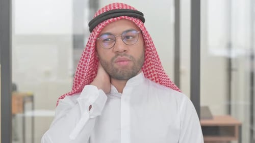 Adult Massaging Neck in Professional Office