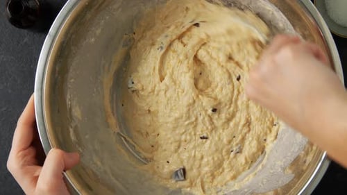 Female Hands Baking Chocolate Batter
