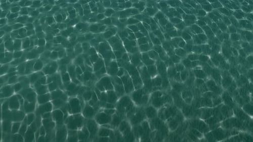 Shimmering Light Reflections on Underwater Surface Background