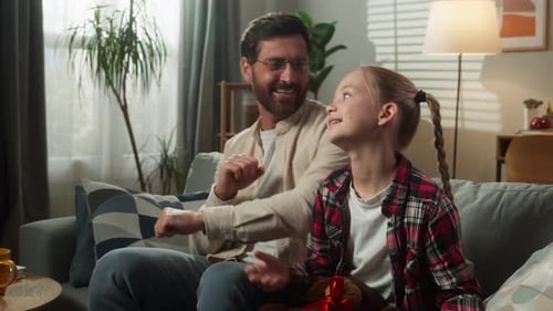 Dad and Daughter Sing and Dance Together
