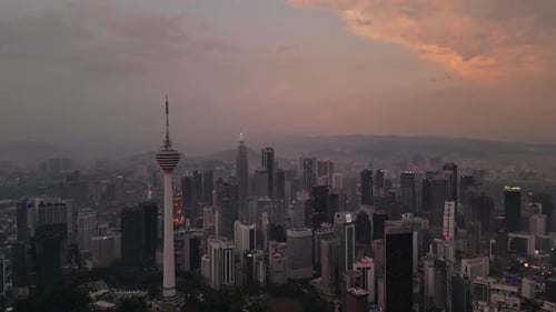 Aerial view of KL Tower and city buildings, Malaysia.
