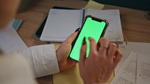Smartphone Green Screen Used in Office Environment