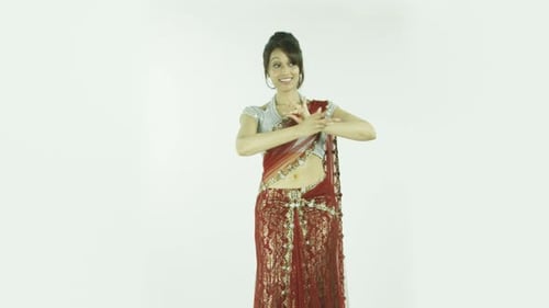 woman in traditiona indian outfit isolated on white dancing
