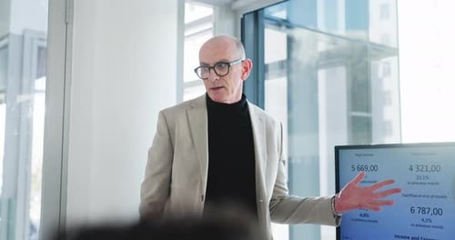 Business, presentation and man in meeting, financial agency and feedback for company revenue