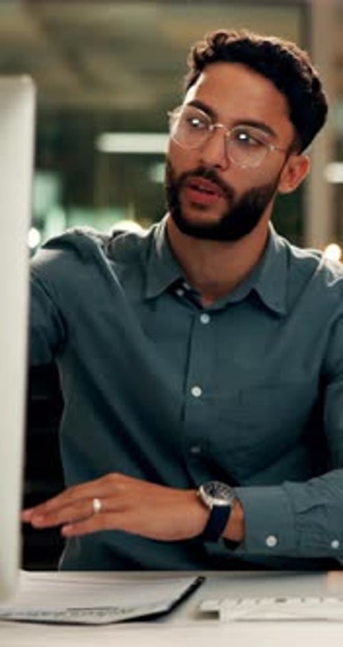 Coworking, pointing and man in office for web design, research ideas and software developer