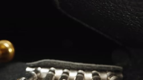 A set of small screwdrivers for the watch. Dolly slider extreme close-up. Laowa Probe