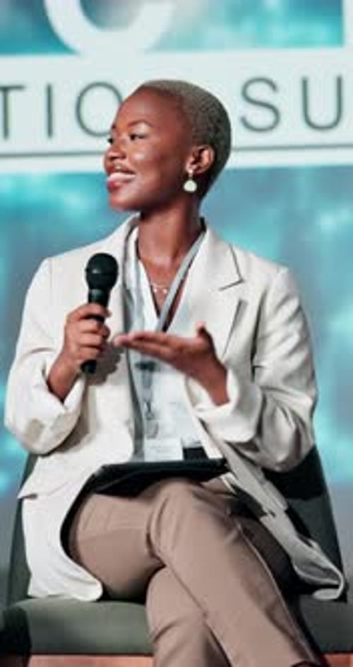 Woman Speaks at Business Conference Event