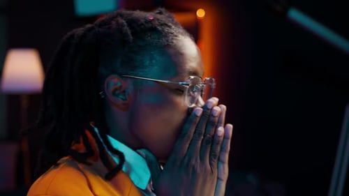 Sad Young Adult Overwhelmed at Computer