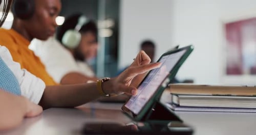 Tablet, hands and student in classroom scrolling at university for research with studying for exam