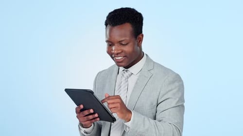 Happy black man, tablet and research for communication, social media or networking against a studio
