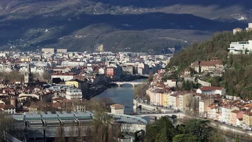 Aerial Panorama of Grenoble City Center Isere River Winding Near Bastille Hill Urban Terrain Framed