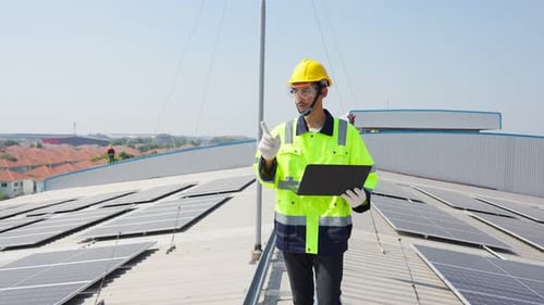 Professional engineer work to maintenance of photovoltaic panel system.