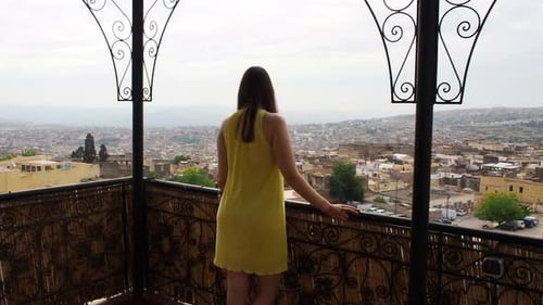 4K Footage of woman looking to the old Medina in Fez (Fes El Bali), Morocco The ancient city and ria