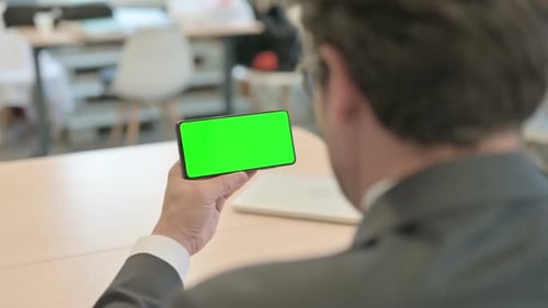 Businessman Using Smartphone with Chroma Key
