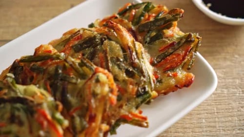 Vegetable Pancakes with Sauce on Wooden Table