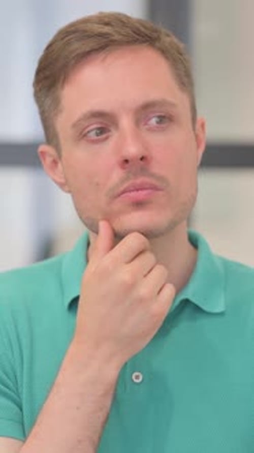 Portrait of Mature Adult Man Brainstorming New Idea