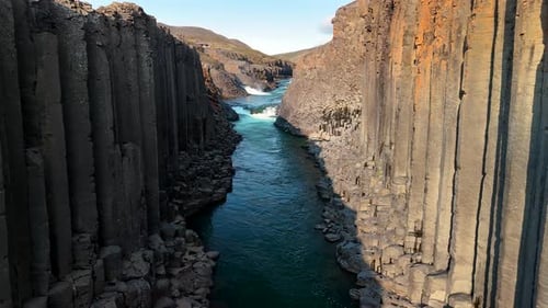 Discover the Stunning Beauty of Studlagil Canyon in Iceland with Majestic Rock Formations