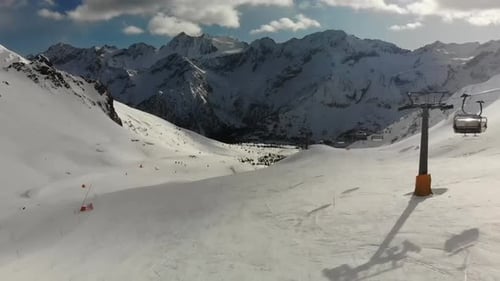 Aerial video of people snowboarding and skiing in South Tyrol